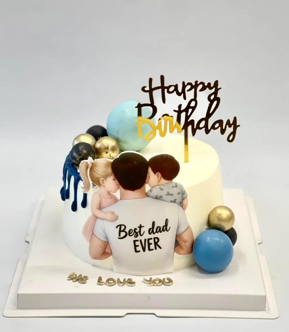 White birthday cake with a Best Dad Ever print of a father holding two kids, balloon spheres and gold topper